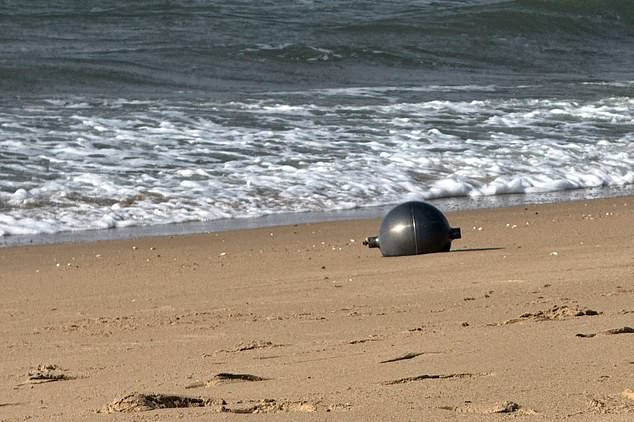 The mystery of the mysterious metal balls washed up on the beach has been solved