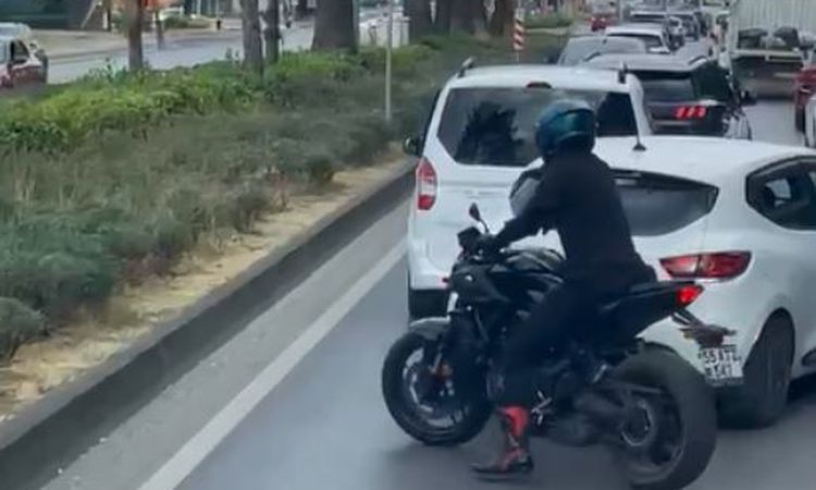 Motorcyclist Makes Way for Fire Truck Responding to Call.